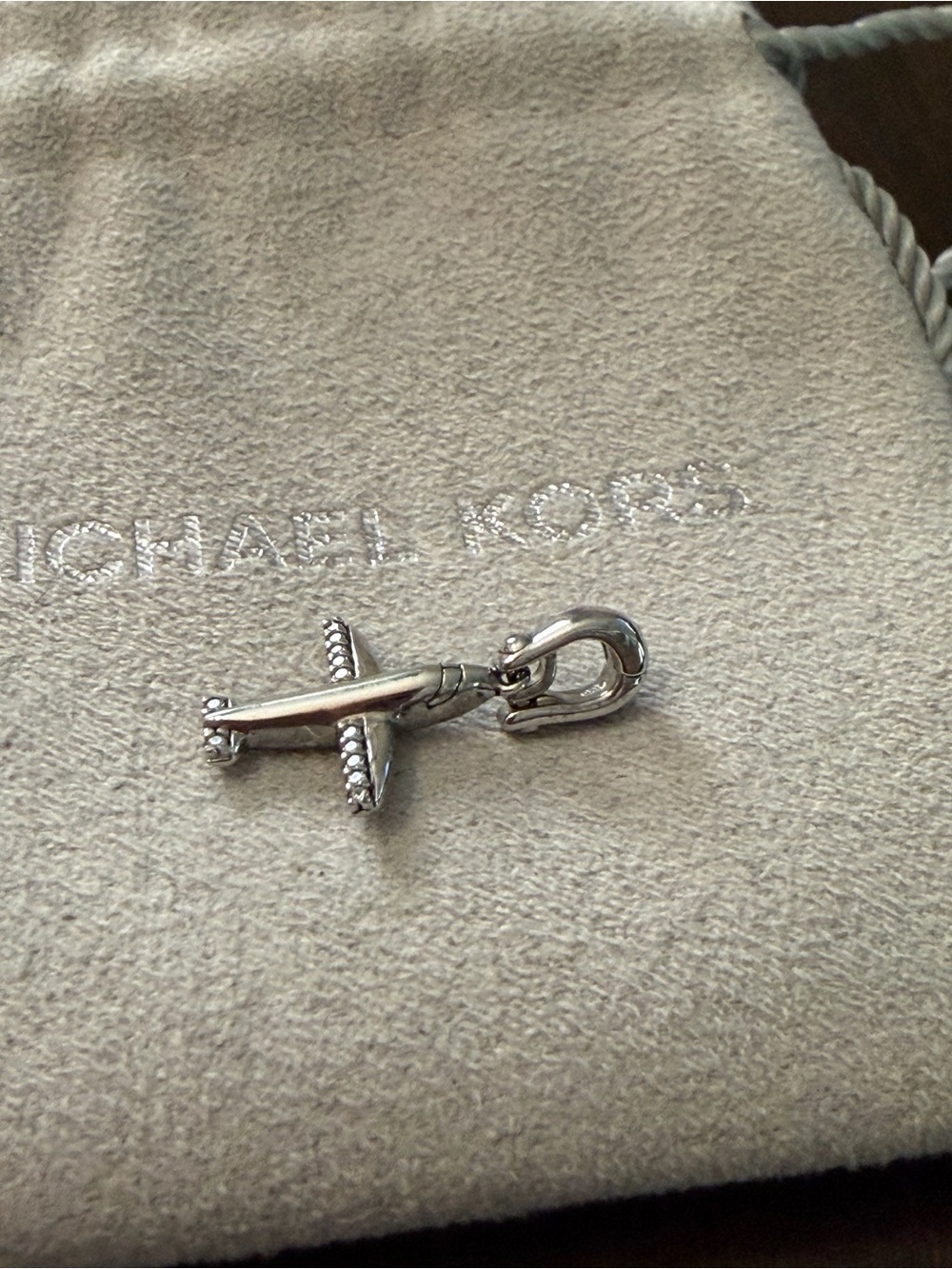 Michael Kors Silver Airplane Charm with Crystal Accents - Picture 2 of 5